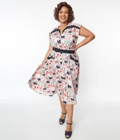 Unique Vintage Plus Size Peach Skunk Print Hedda Swing Dress