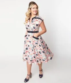 Unique Vintage Peach Skunk Print Hedda Swing Dress