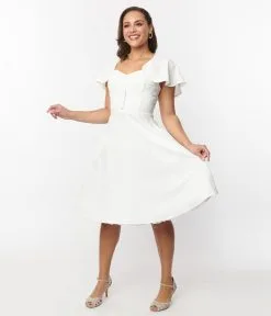 Unique Vintage Ivory Capelet Swing Dress