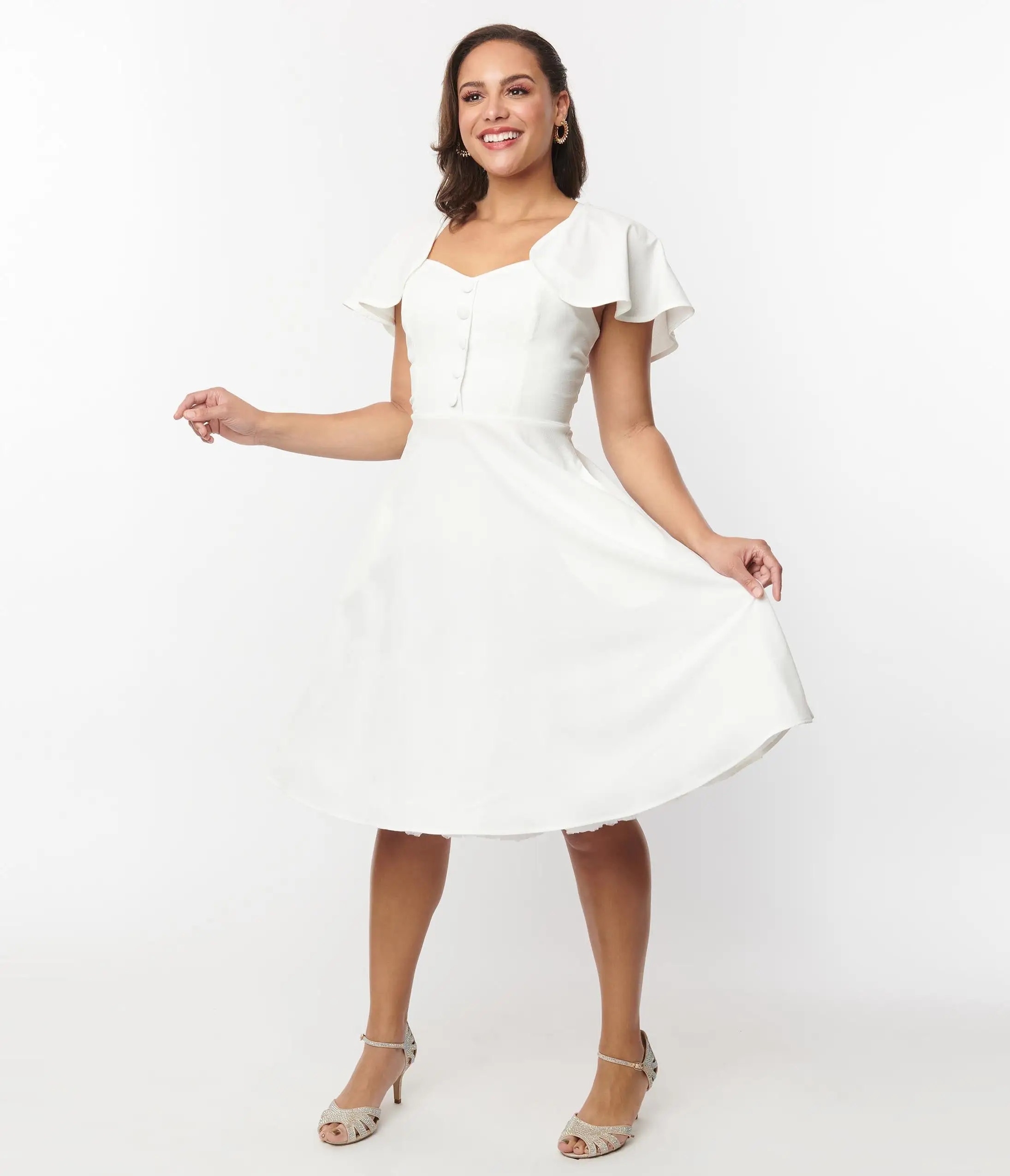 Unique Vintage Ivory Capelet Swing Dress